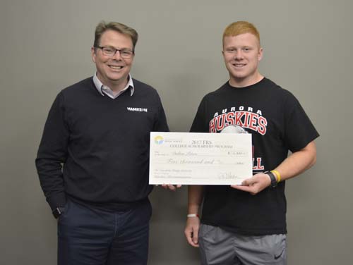 FRS Scholarship winner check presented by John Nelson. 